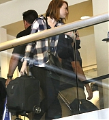 Emma Stone Arrives at LAX Airport - May 6