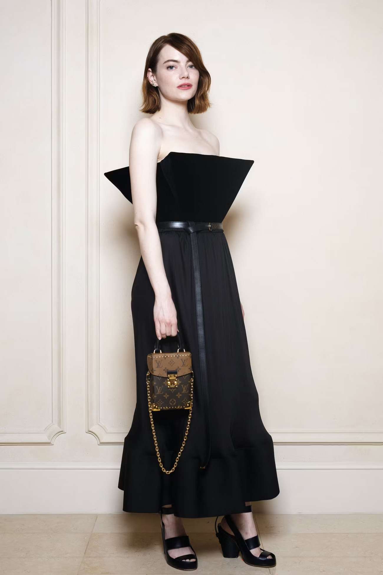 Emma Stone Poses for Louis Vuitton private dinner at the Hotel Ritz on June 08